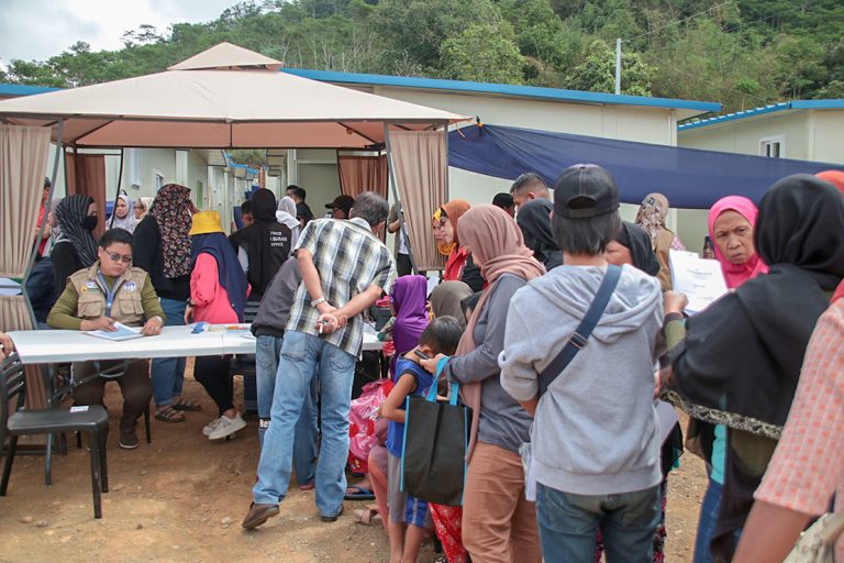 Community-based IDPs express gratitude as they transfer to transitory shelter site